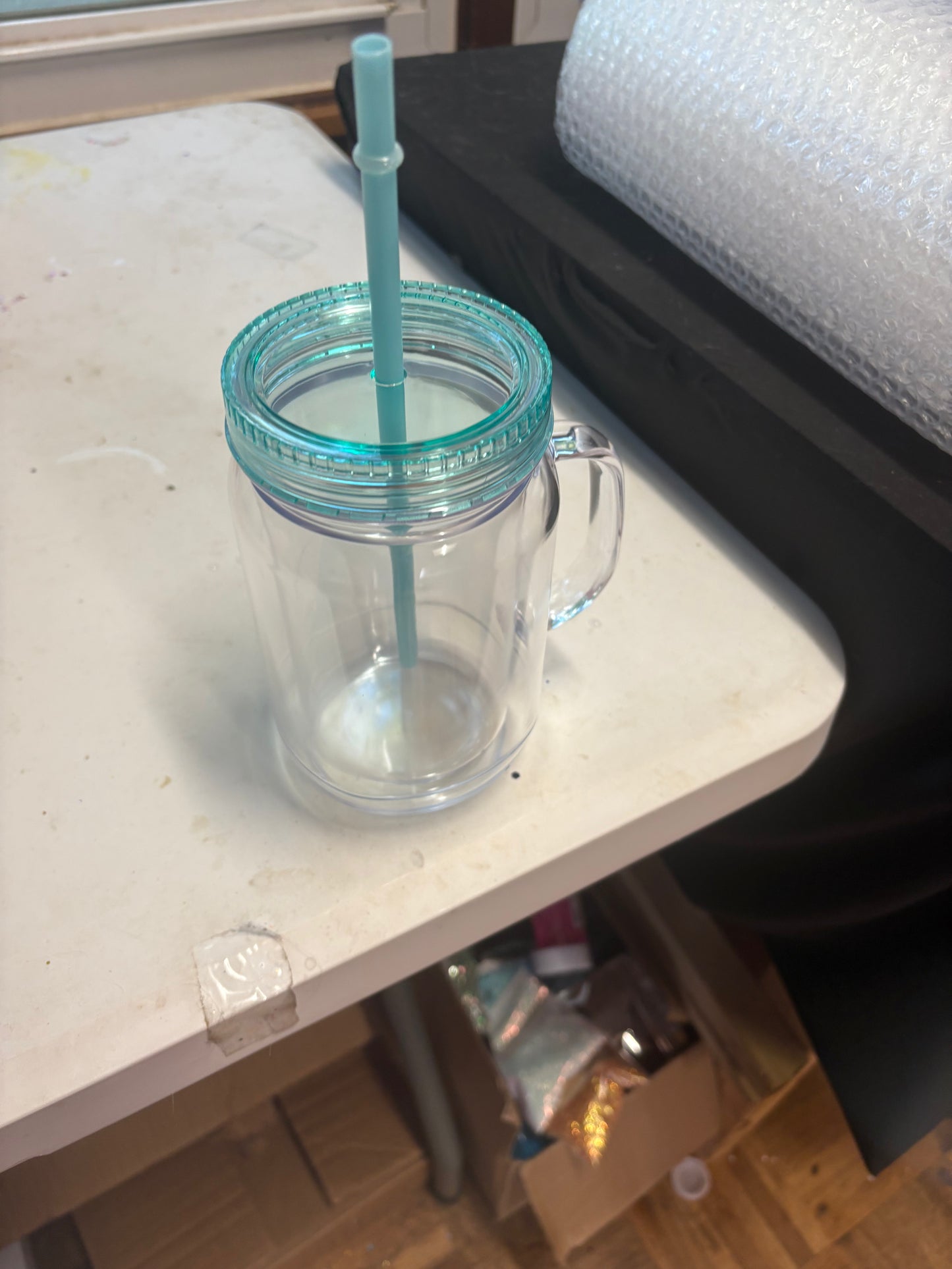A 20 oz mason jar snow globe cup