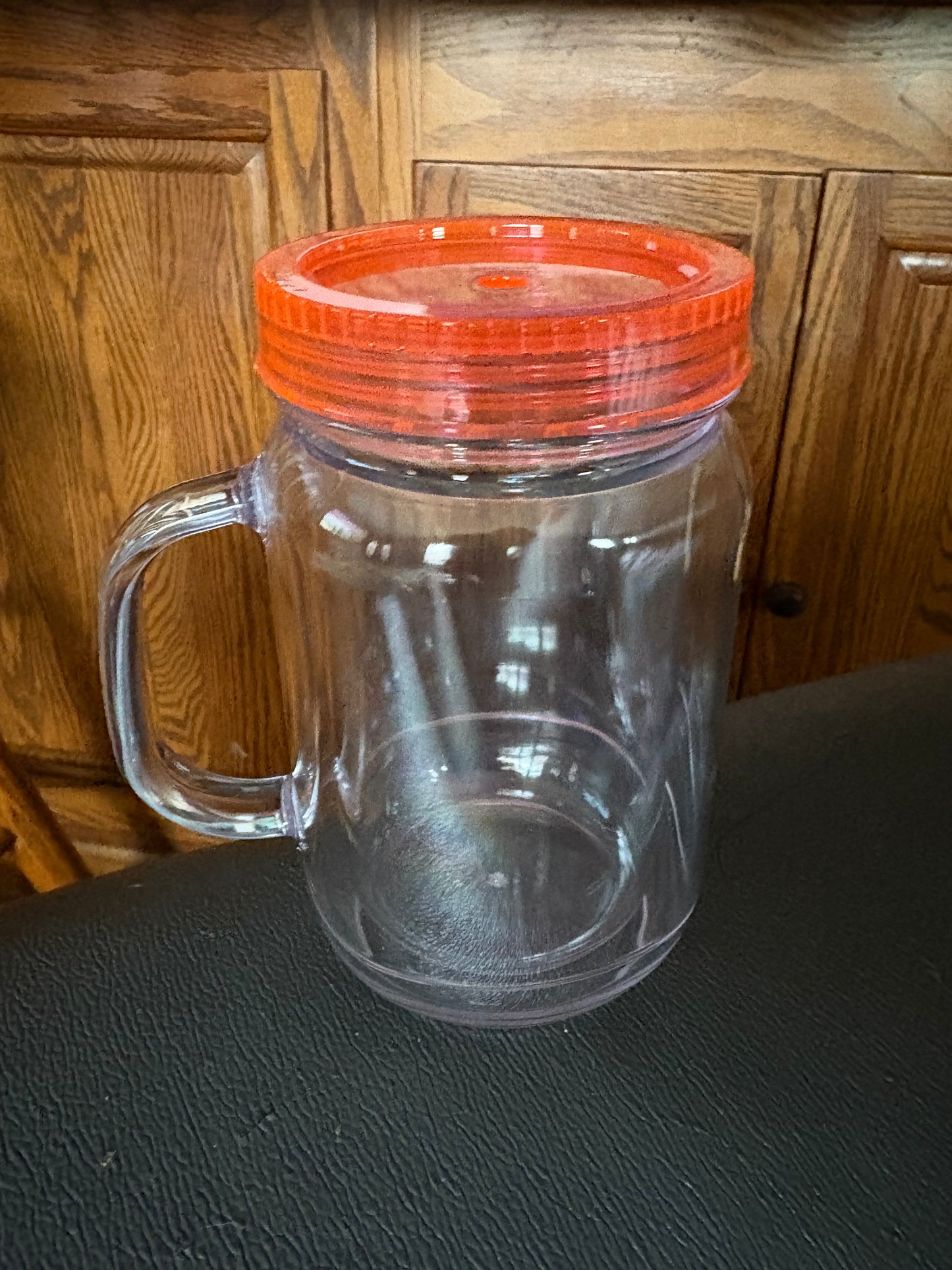 A 20 oz mason jar snow globe cup